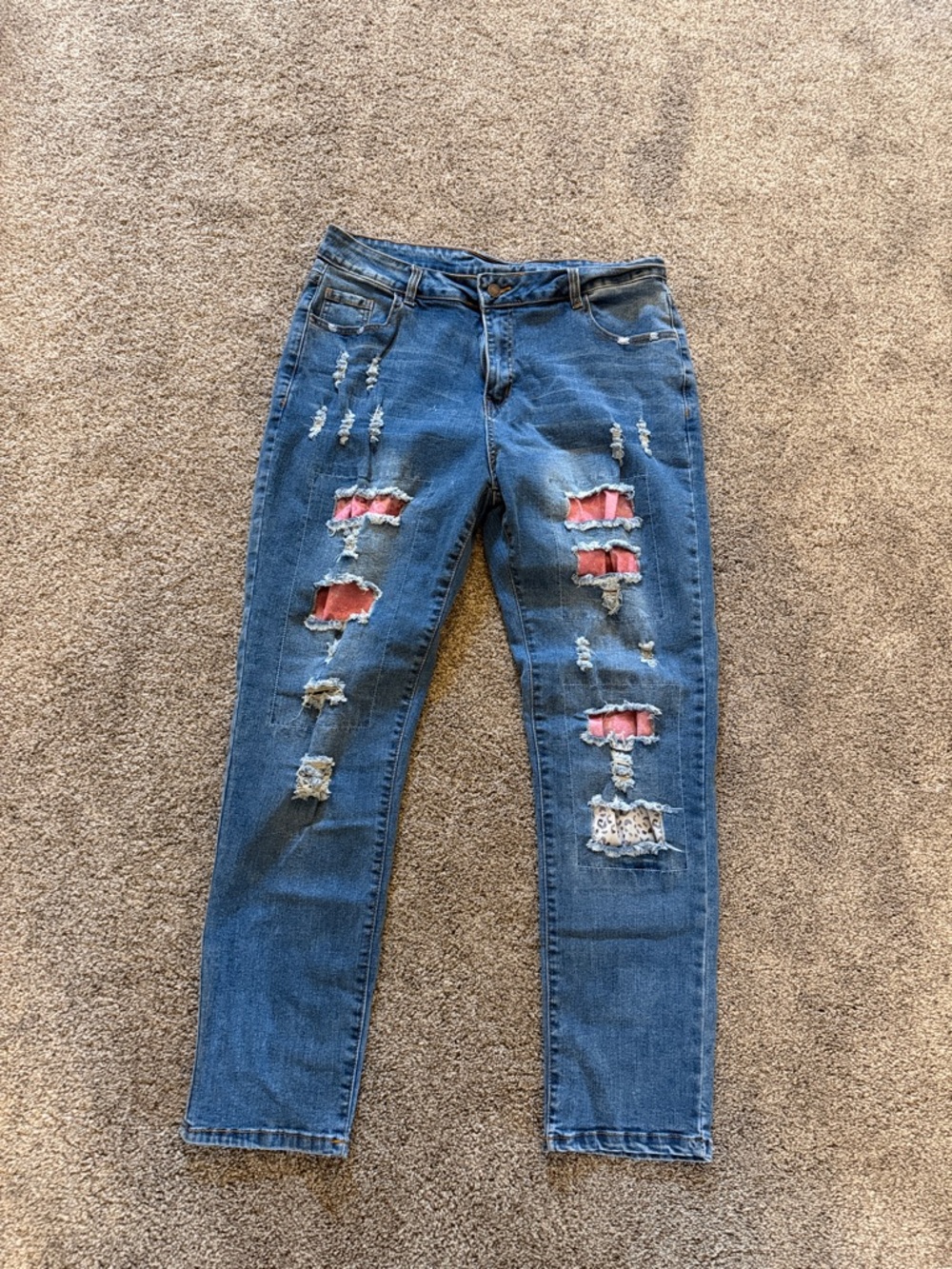 Distressed Blue Women's Ripped Jeans with Pink Underlay